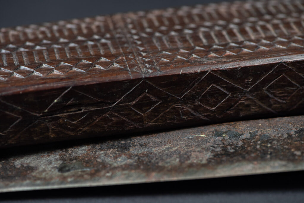 This sword is known as Pararowai, originates from the Yami tribe of Orchid Island Intricately carved with traditional Yami tribal motifs.