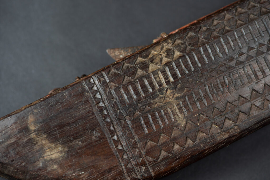 This sword is known as Pararowai, originates from the Yami tribe of Orchid Island Intricately carved with traditional Yami tribal motifs.