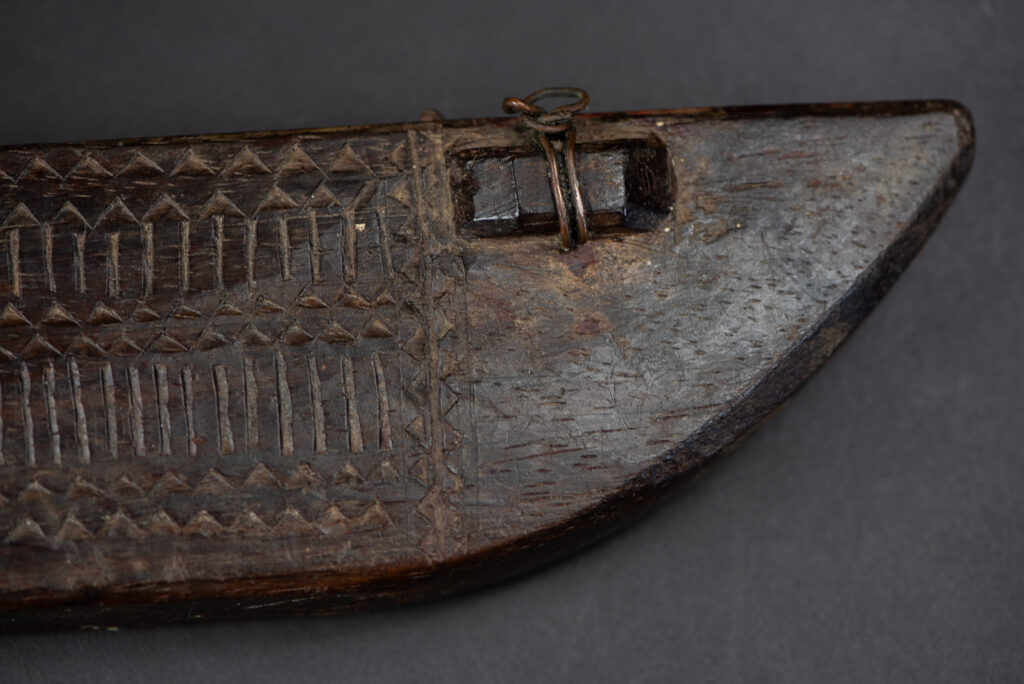 This sword is known as Pararowai, originates from the Yami tribe of Orchid Island Intricately carved with traditional Yami tribal motifs.