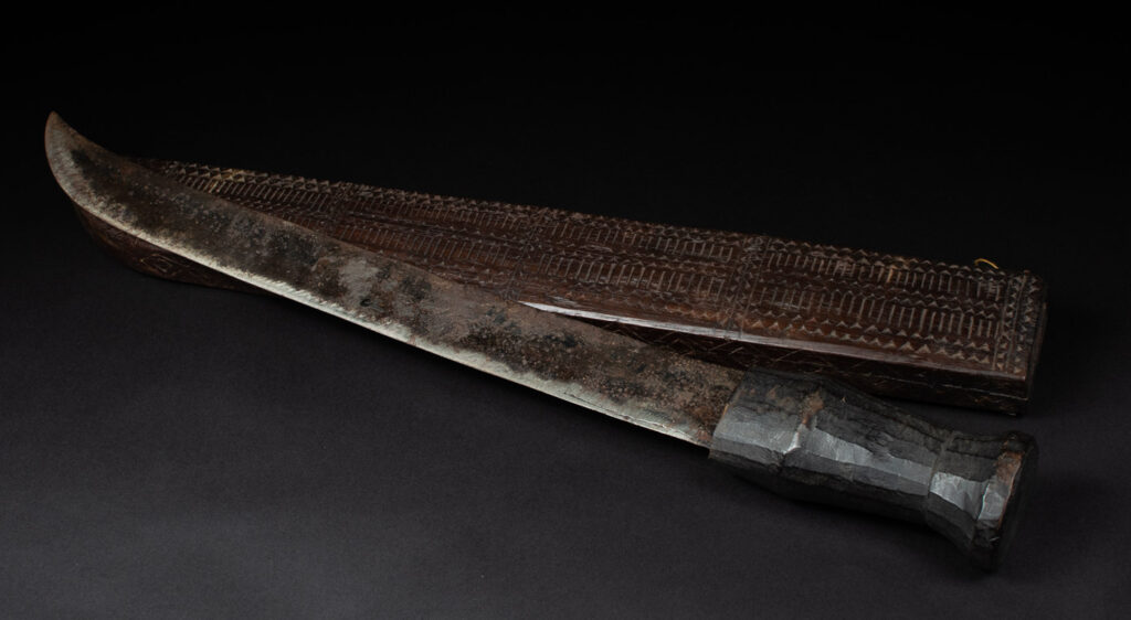 This sword is known as Pararowai, originates from the Yami tribe of Orchid Island Intricately carved with traditional Yami tribal motifs.