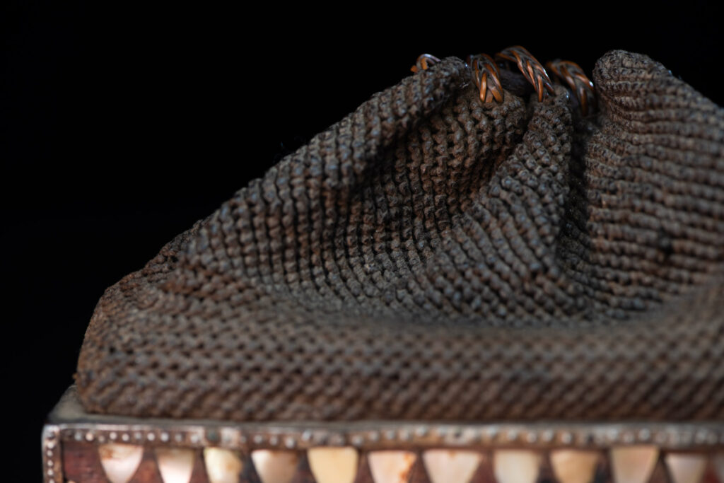 Old shaman’s box – Puyuma tribe – inlaid with mother-of-pearl in triangular patterns, reflecting the distinctive style of the Puyuma tribes. The box is also decorated with embedded old coins.