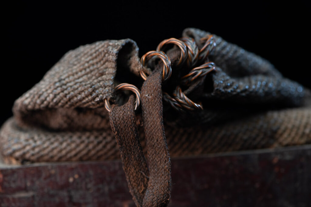 Old shaman’s box – Puyuma tribe – inlaid with mother-of-pearl in triangular patterns, reflecting the distinctive style of the Puyuma tribes. The box is also decorated with embedded old coins.