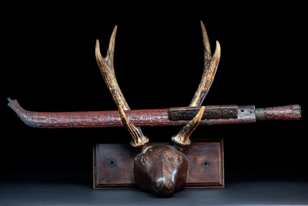 Exceptional and rare Taiwan ceremonial sword. Probably early 19th century. Paint with red pigments.