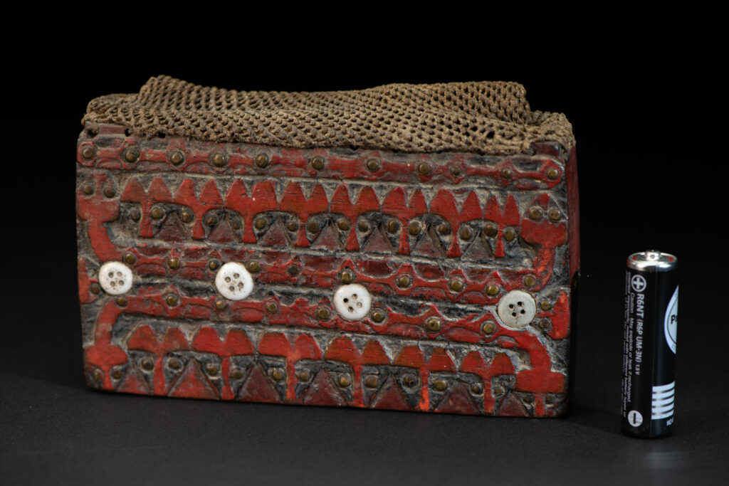 Shaman box from Paiwan tribe -Taiwan . Fully carved and paint in red .