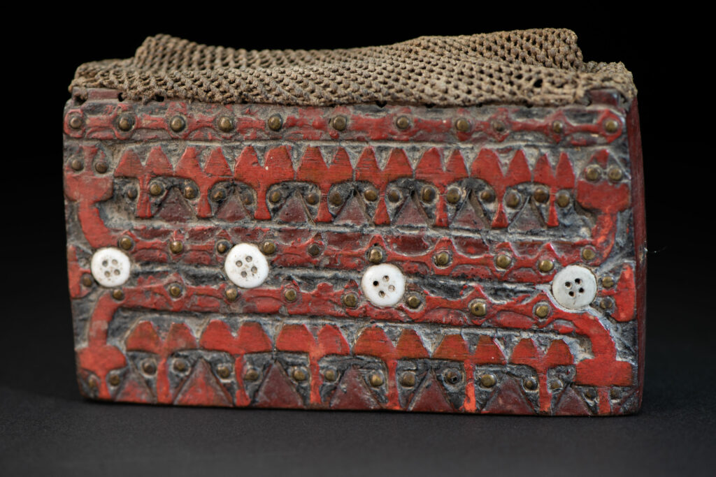 Shaman box from Paiwan tribe -Taiwan . Fully carved and paint in red .