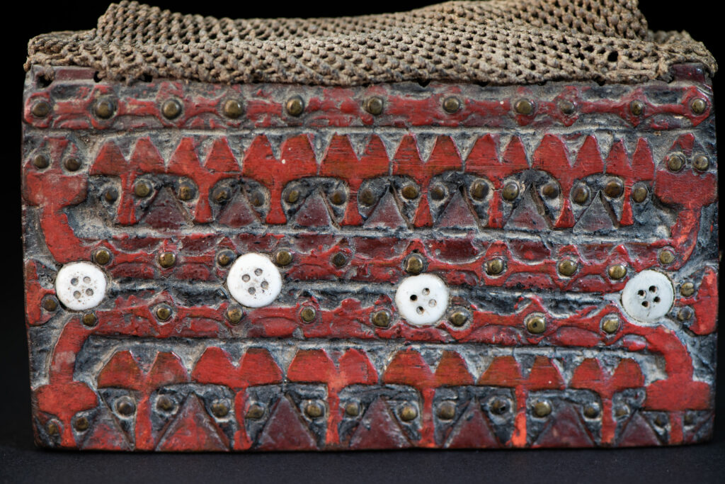Shaman box from Paiwan tribe -Taiwan . Fully carved and paint in red .
