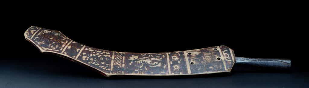 Sword of the Pingpu tribes (plains aborigines), featuring typical Pingpu style: floral painted design on the back of the scabbard; sword hilt forged in one piece with the blade, without separate assembly and attayal tribe influence on design.