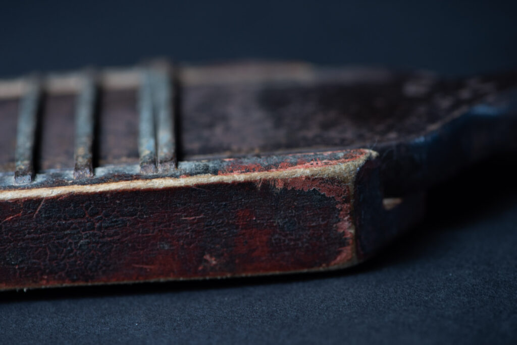 Sword of the Pingpu tribes (plains aborigines), featuring typical Pingpu style: floral painted design on the back of the scabbard; sword hilt forged in one piece with the blade, without separate assembly and attayal tribe influence on design.
