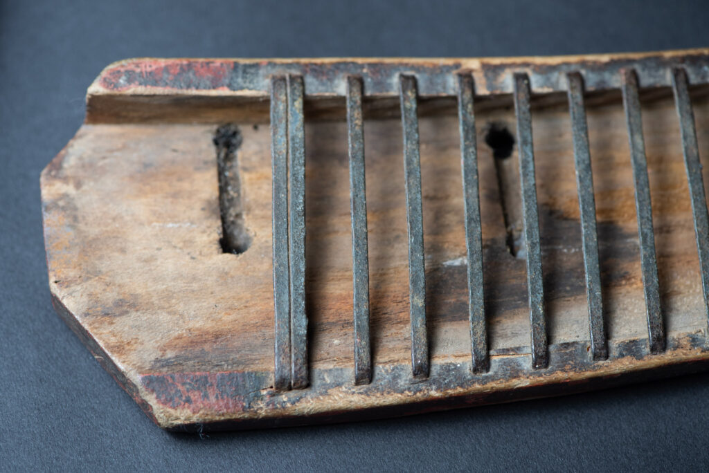 Sword of the Pingpu tribes (plains aborigines), featuring typical Pingpu style: floral painted design on the back of the scabbard; sword hilt forged in one piece with the blade, without separate assembly and attayal tribe influence on design.