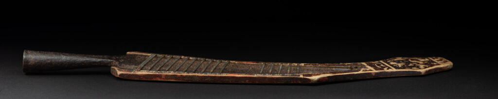 Sword of the Pingpu tribes (plains aborigines), featuring typical Pingpu style: floral painted design on the back of the scabbard; sword hilt forged in one piece with the blade, without separate assembly and attayal tribe influence on design.