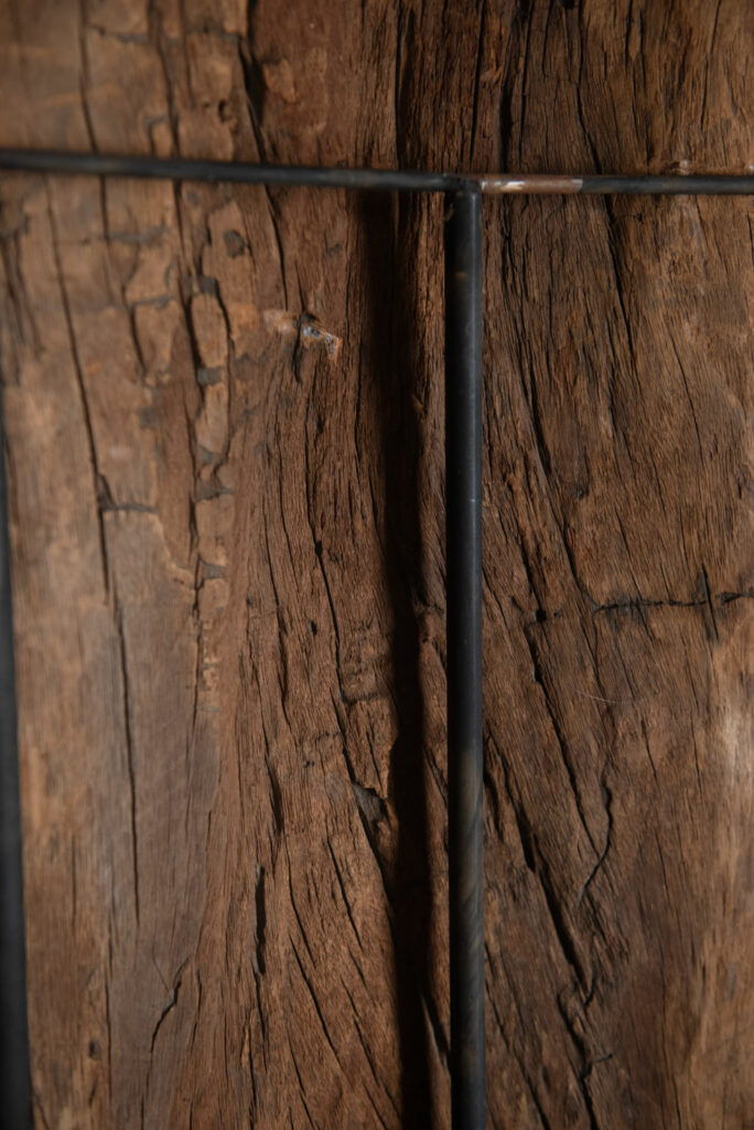 Very beautiful and massive ancestral panel from the Paiwan tribe, dating from the 19th century, carved with a nude female ancestor wearing a headdress formed by two intertwined snakes facing away from each other. A truly remarkable piece.