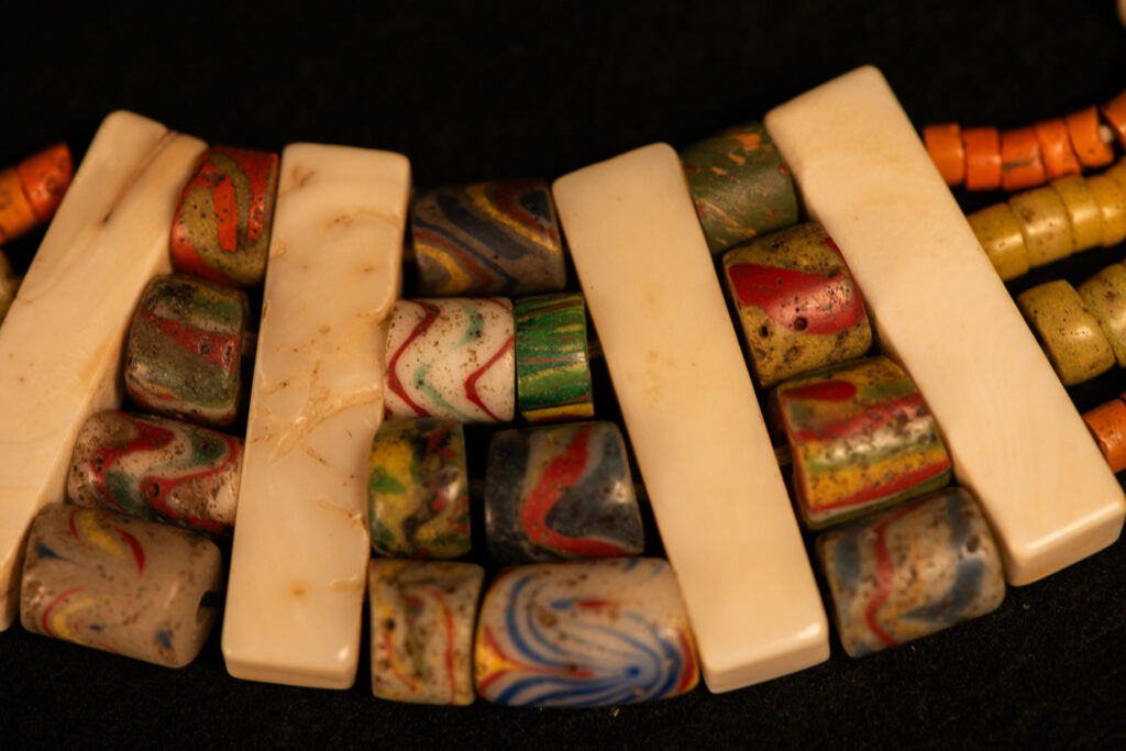 Paiwan tribe old Glass beads collar In Paiwan society, ancient and valuable glass beads are treasured as heirlooms or betrothal gifts, symbolizing aristocratic status. These beads are often carefully stored in old pottery jars.