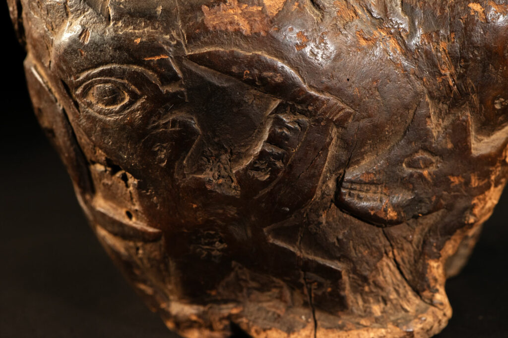 Paiwan tribe archaic ritual cup of a shaman carved with a standing hunter at the front, sacred snakes , deer on the lid and a hunter with his dog hunting a wilde animal