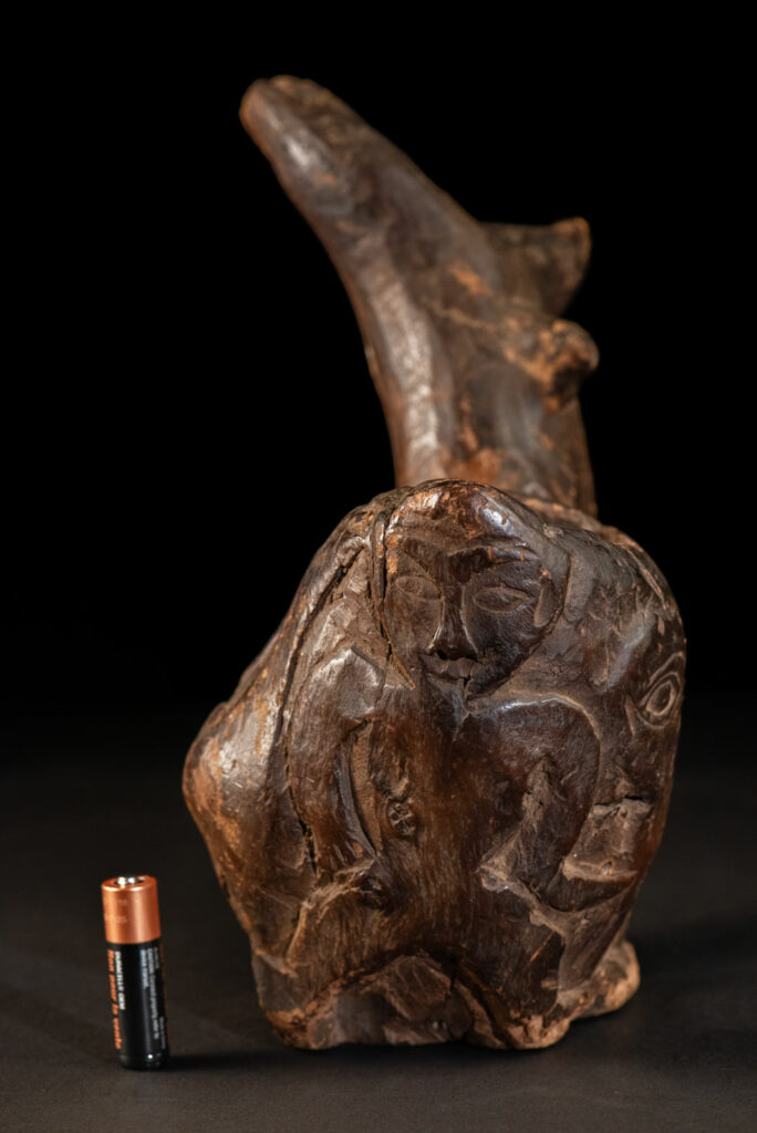 Paiwan tribe archaic ritual cup of a shaman carved with a standing hunter at the front, sacred snakes , deer on the lid and a hunter with his dog hunting a wilde animal