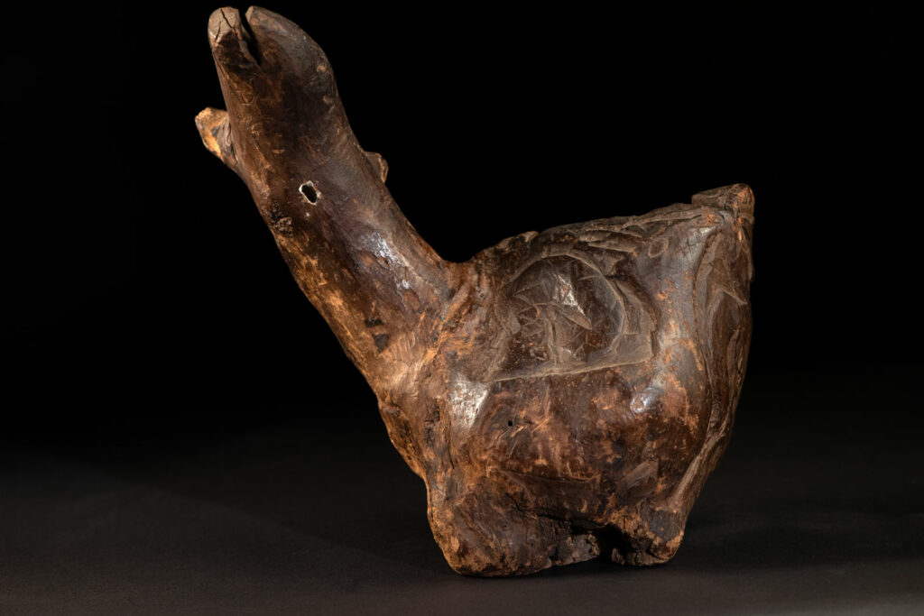 Paiwan tribe archaic ritual cup of a shaman carved with a standing hunter at the front, sacred snakes , deer on the lid and a hunter with his dog hunting a wilde animal