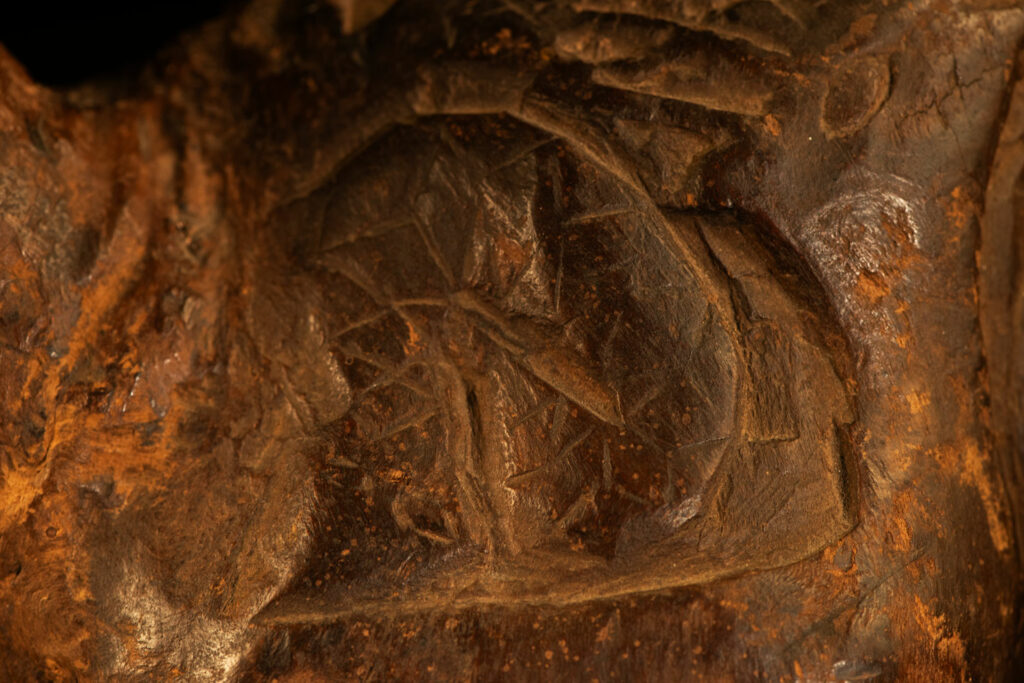 Paiwan tribe archaic ritual cup of a shaman carved with a standing hunter at the front, sacred snakes , deer on the lid and a hunter with his dog hunting a wilde animal