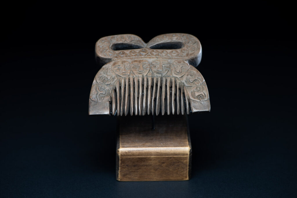 Ancient Paiwan tribe wooden Comb carved with eight human figures snake on the top