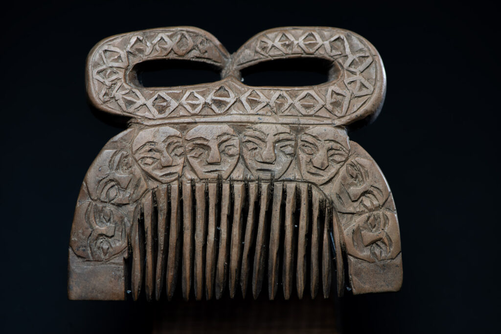 Ancient Paiwan tribe wooden Comb carved with eight human figures snake on the top