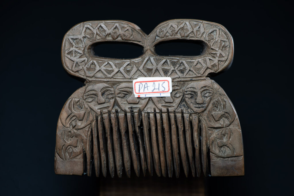 Ancient Paiwan tribe wooden Comb carved with eight human figures snake on the top
