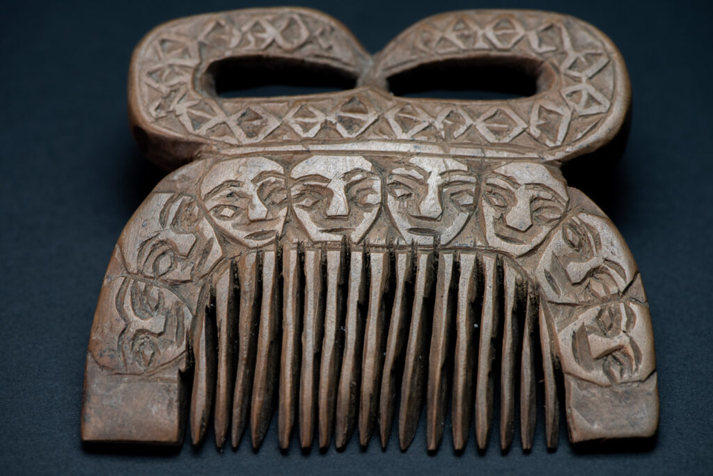 Ancient Paiwan tribe wooden Comb carved with eight human figures snake on the top