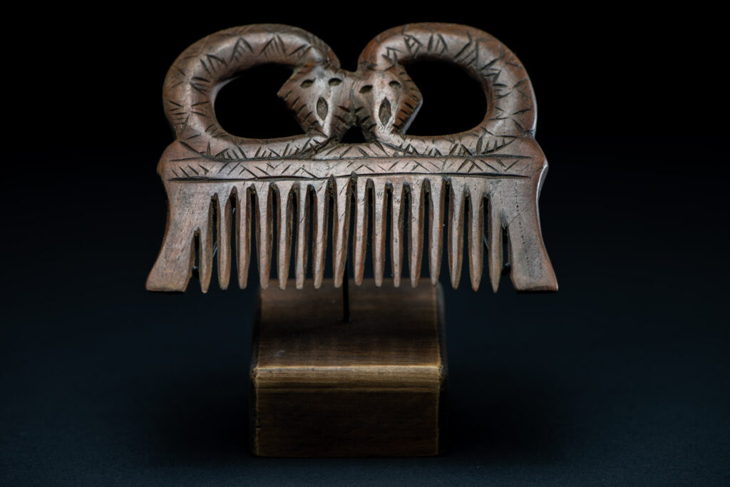 Ancient Paiwan tribe wooden Comb carved with two snake on the top