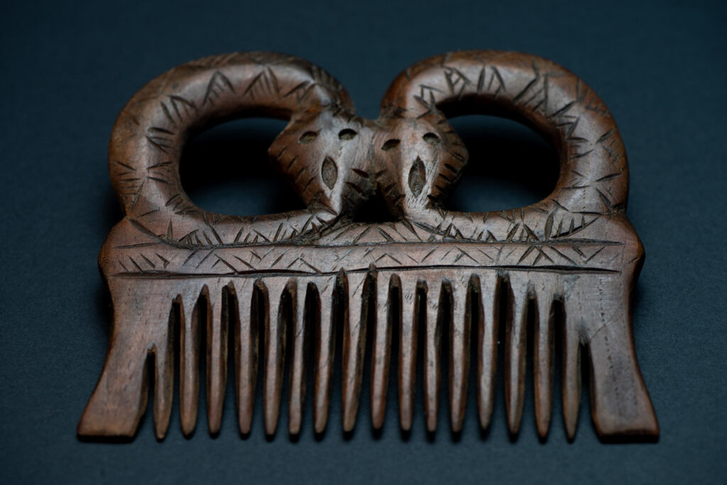 Ancient Paiwan tribe wooden Comb carved with two snake on the top