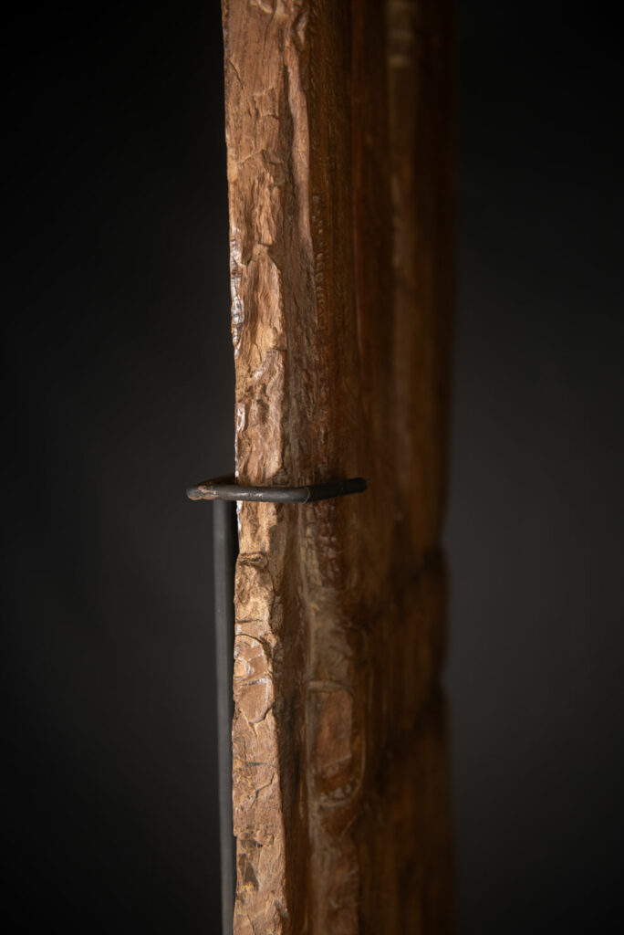 Ancient massive paiwan tribe ancestor panel carved with a standing figure of an ancestor Wearing a two-headed snake as a headdress and a ceremonial belt.