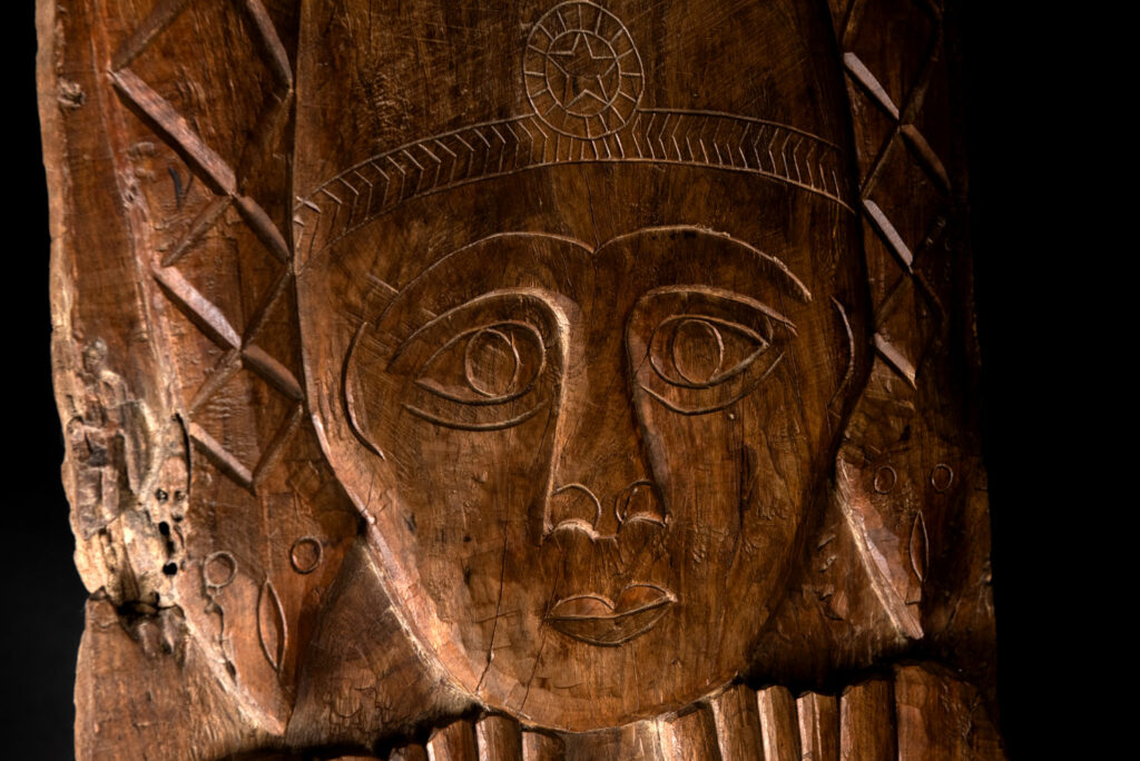 Ancient massive paiwan tribe ancestor panel carved with a standing figure of an ancestor Wearing a two-headed snake as a headdress and a ceremonial belt.