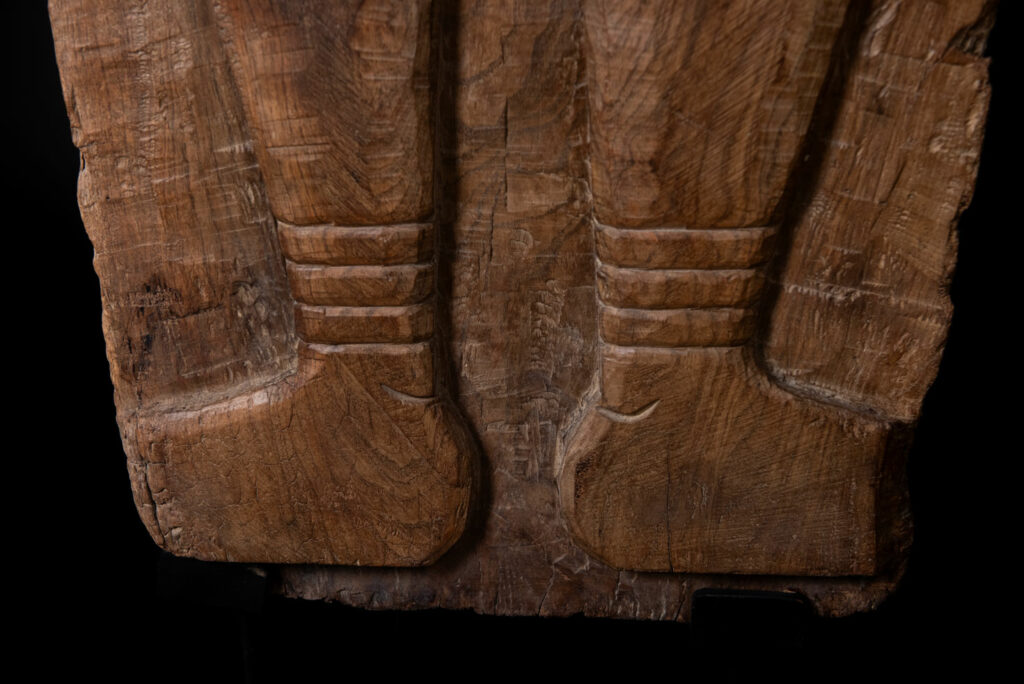 Ancient massive paiwan tribe ancestor panel carved with a standing figure of an ancestor Wearing a two-headed snake as a headdress and a ceremonial belt.
