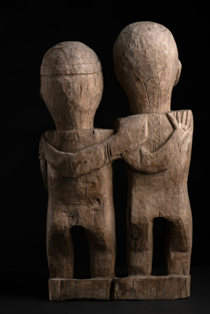 Ancient Statue of the Paiwan tribe : A couple holding each other male and female, probably husband and wife.