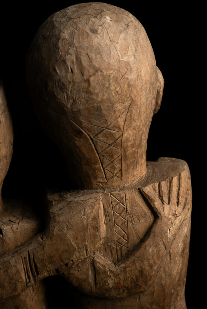 Ancient Statue of the Paiwan tribe : A couple holding each other male and female, probably husband and wife.