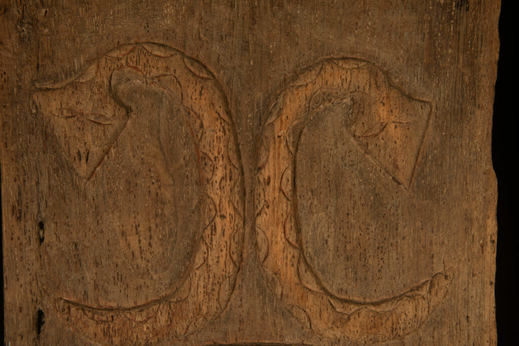 Paiwan tribes wood Door- 19 century - Standing figure and sacred snakes, two on the figure and two on a sides- south Taiwan. detail