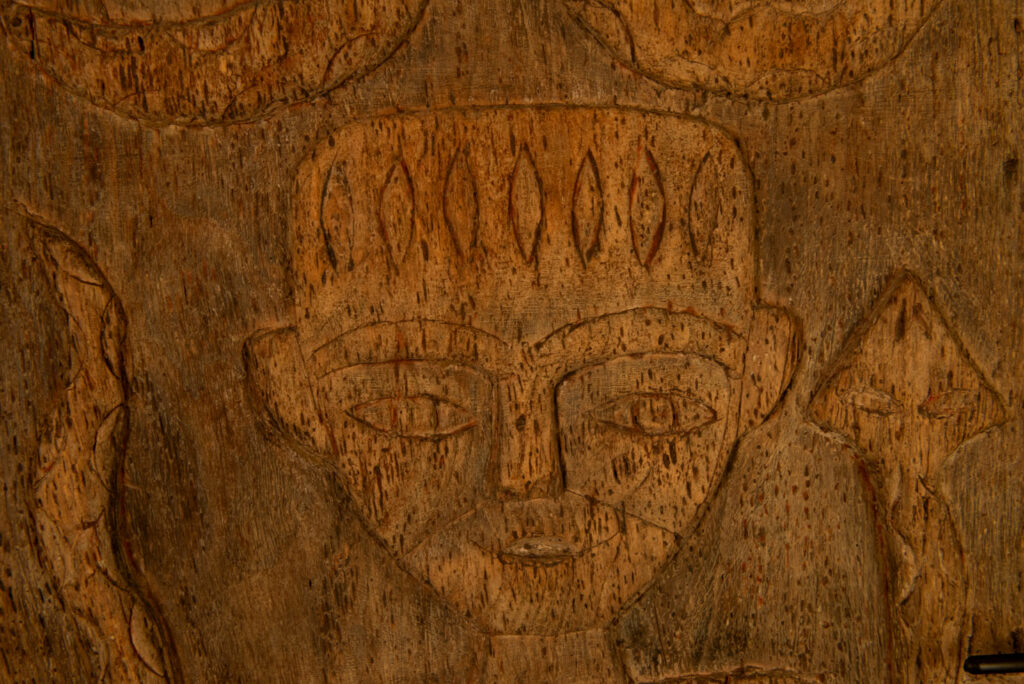 Paiwan tribes wood Door- 19 century - Standing figure and sacred snakes, two on the figure and two on a sides- south Taiwan. detail