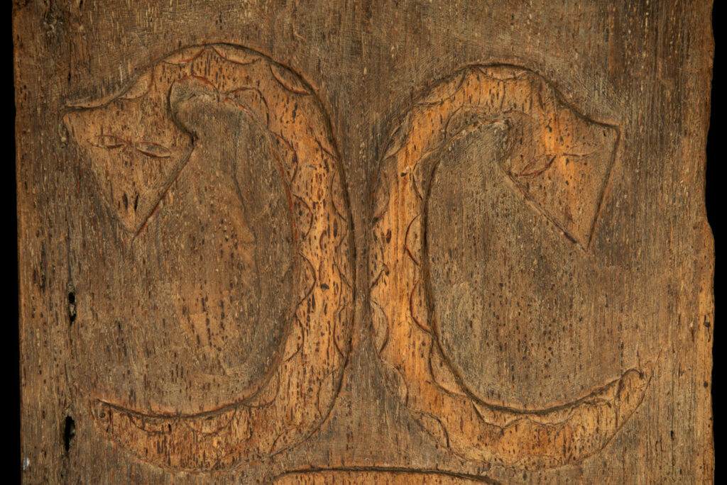 Paiwan tribes wood Door- 19 century - Standing figure and sacred snakes, two on the figure and two on a sides- south Taiwan. detail