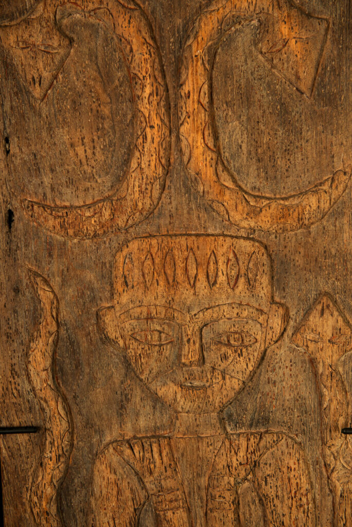 Paiwan tribes wood Door- 19 century - Standing figure and sacred snakes, two on the figure and two on a sides- south Taiwan. detail