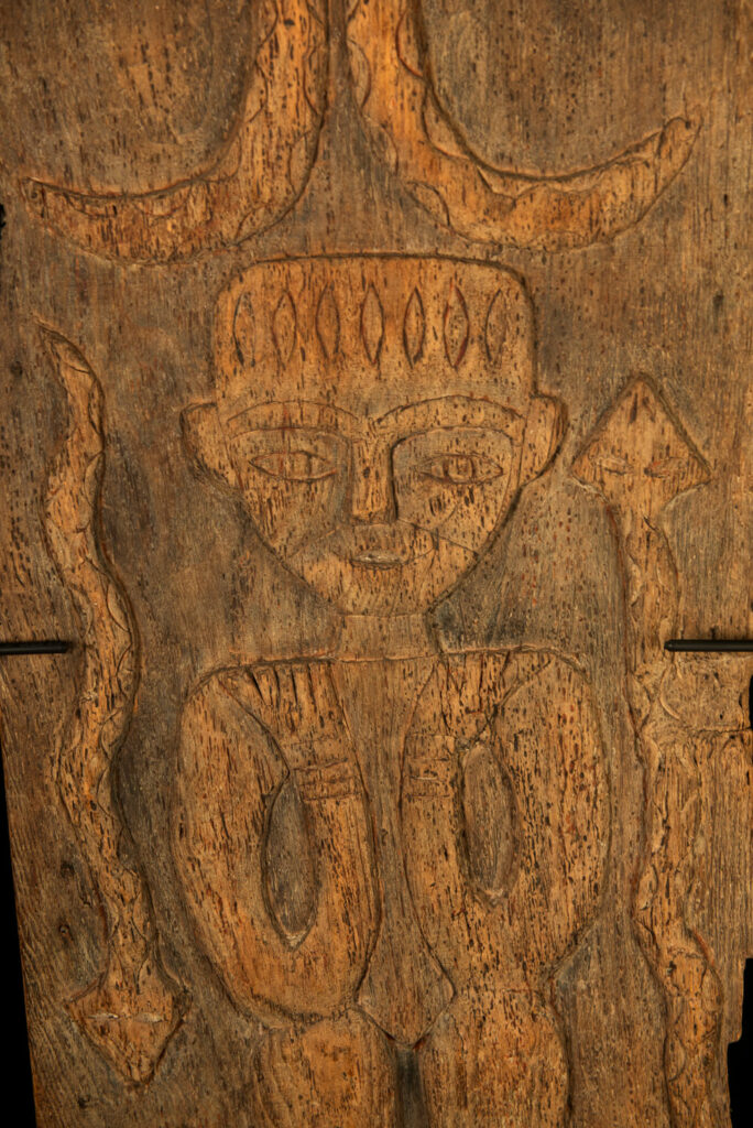 Paiwan tribes wood Door- 19 century - Standing figure and sacred snakes, two on the figure and two on a sides- south Taiwan. detail