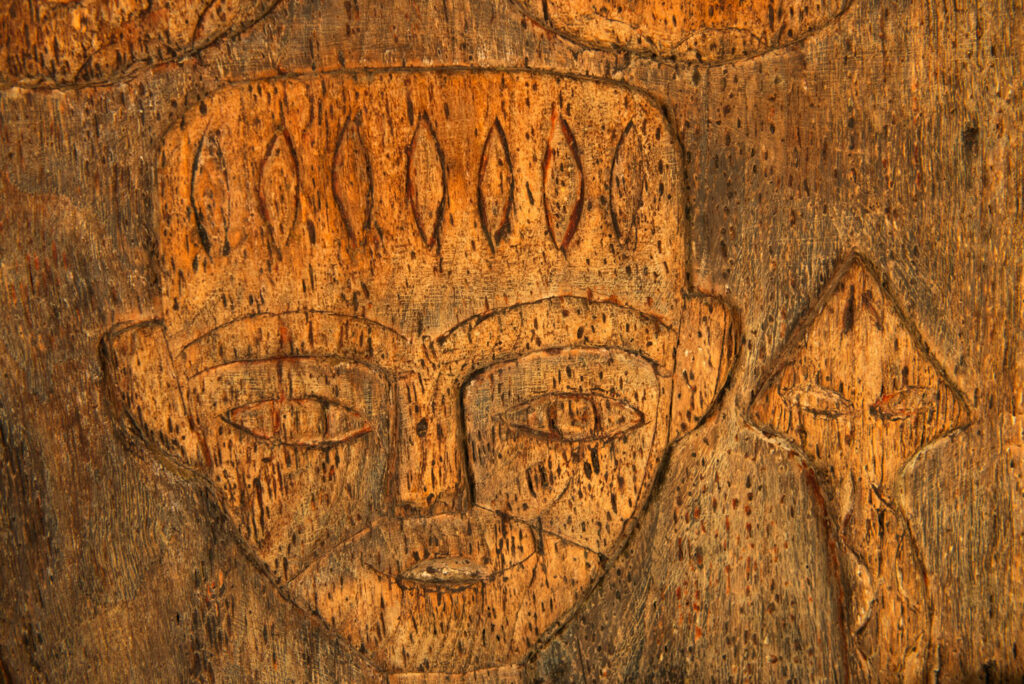 Paiwan tribes wood Door- 19 century - Standing figure and sacred snakes, two on the figure and two on a sides- south Taiwan. detail