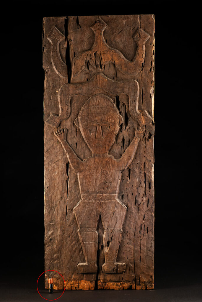 ancient Paiwan tribe panel carved with a standing man, part of a house partition or used as small doors or shutters – South Taiwan