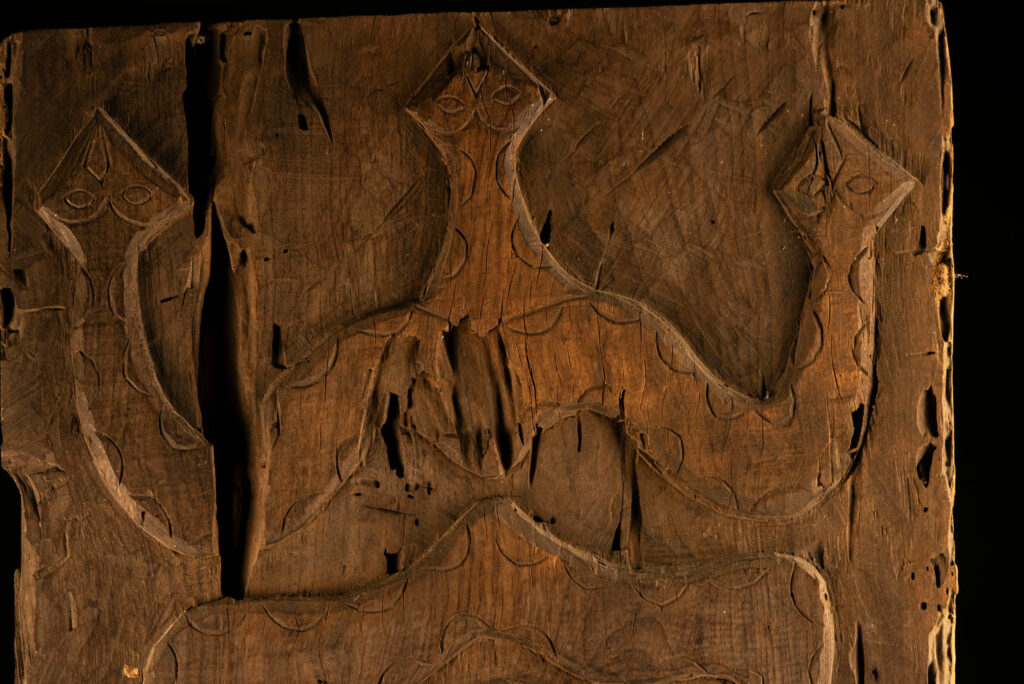 ancient Paiwan tribe panel carved with a standing man, part of a house partition or used as small doors or shutters – South Taiwan