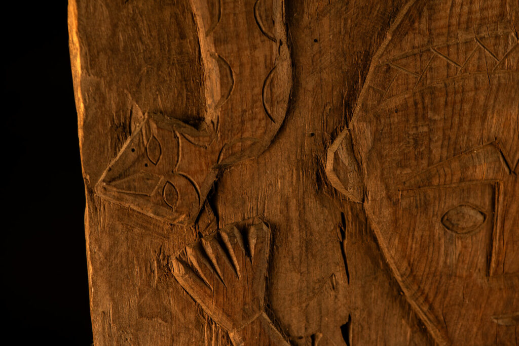 ancient Paiwan tribe panel carved with a standing man, part of a house partition or used as small doors or shutters – South Taiwan