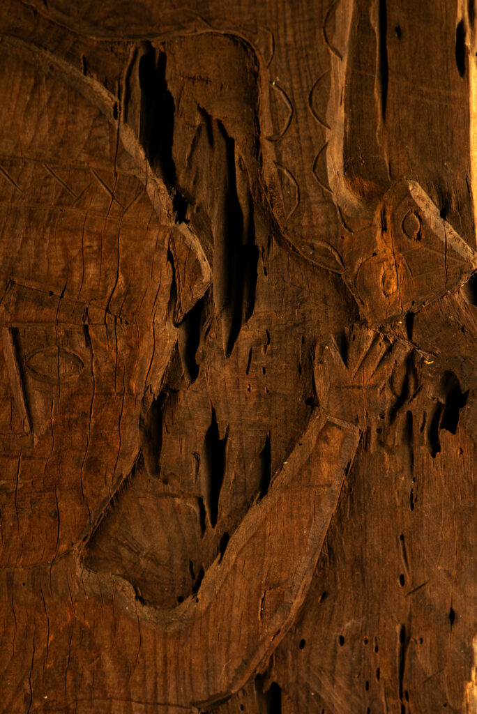 ancient Paiwan tribe panel carved with a standing man, part of a house partition or used as small doors or shutters – South Taiwan
