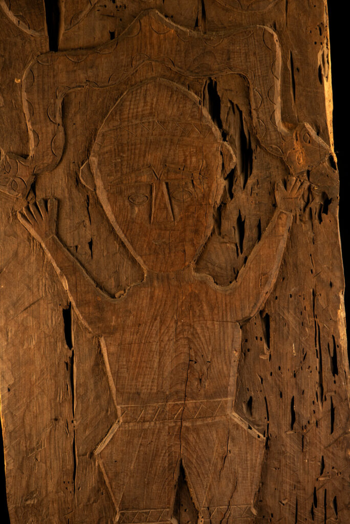 ancient Paiwan tribe panel carved with a standing man, part of a house partition or used as small doors or shutters – South Taiwan