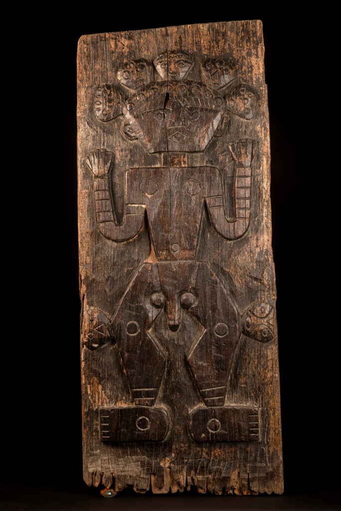 ancient Paiwan tribe panel carved with a standing man, part of a house partition or used as small doors or shutters – South Taiwan