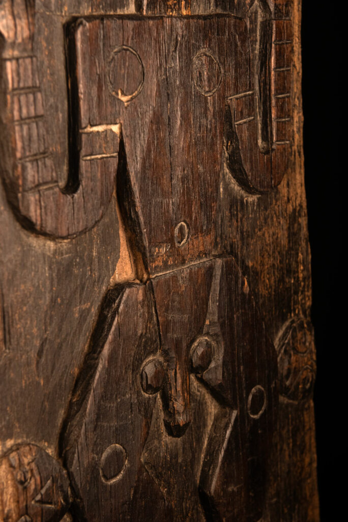 ancient Paiwan tribe panel carved with a standing man, part of a house partition or used as small doors or shutters – South Taiwan