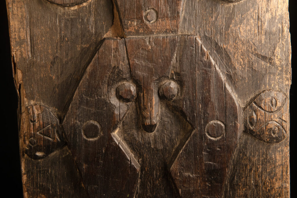 ancient Paiwan tribe panel carved with a standing man, part of a house partition or used as small doors or shutters – South Taiwan