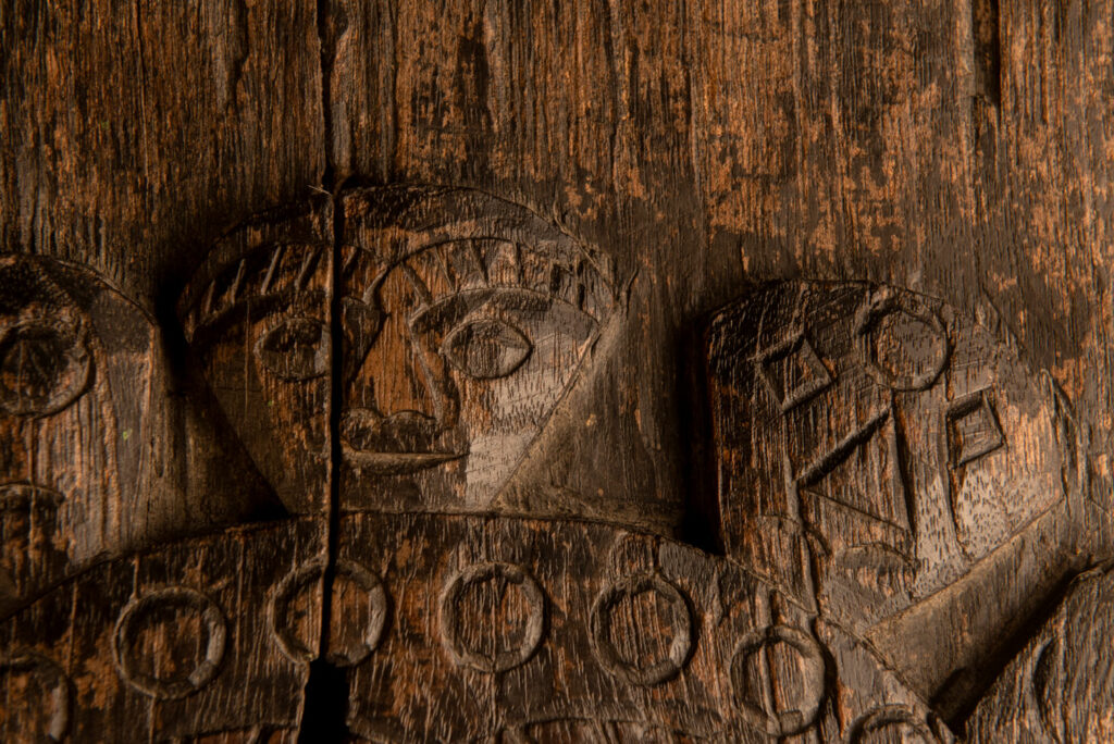 ancient Paiwan tribe panel carved with a standing man, part of a house partition or used as small doors or shutters – South Taiwan