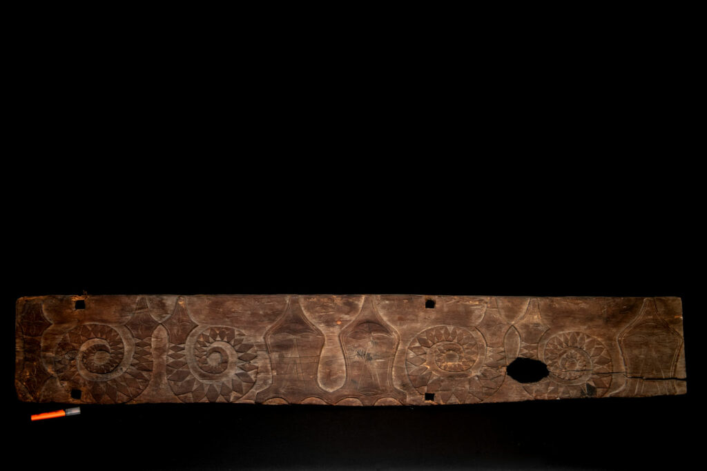 Paiwan tribe house Eave from Majia Township 瑪家鄉 - South Taiwan- Carved with human faces in the Majia style and sacred snakes positioned back to back.