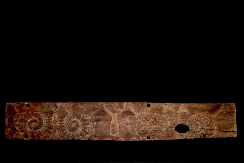 Paiwan tribe house Eave from Majia Township 瑪家鄉 - South Taiwan- Carved with human faces in the Majia style and sacred snakes positioned back to back.