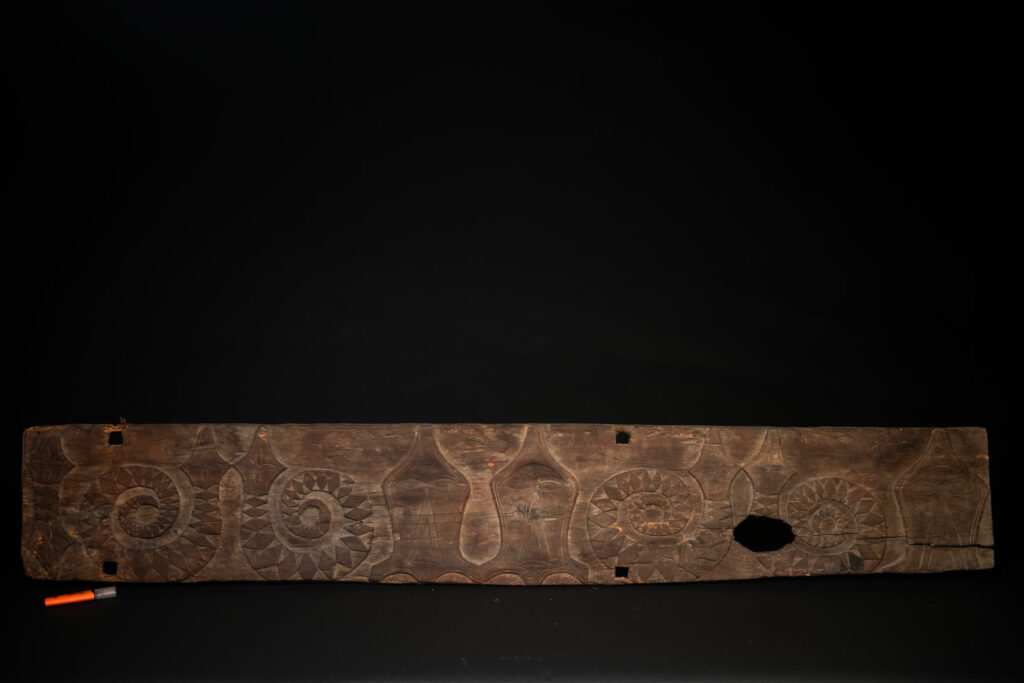 Paiwan tribe house Eave from Majia Township 瑪家鄉 - South Taiwan- Carved with human faces in the Majia style and sacred snakes positioned back to back.