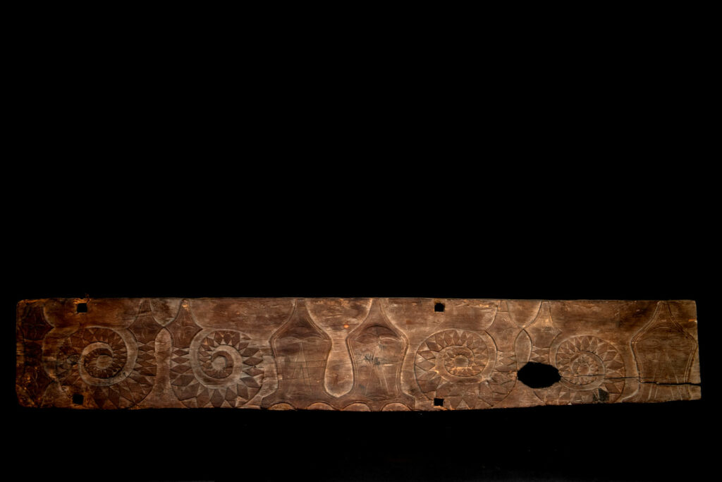 Paiwan tribe house Eave from Majia Township 瑪家鄉 - South Taiwan- Carved with human faces in the Majia style and sacred snakes positioned back to back.